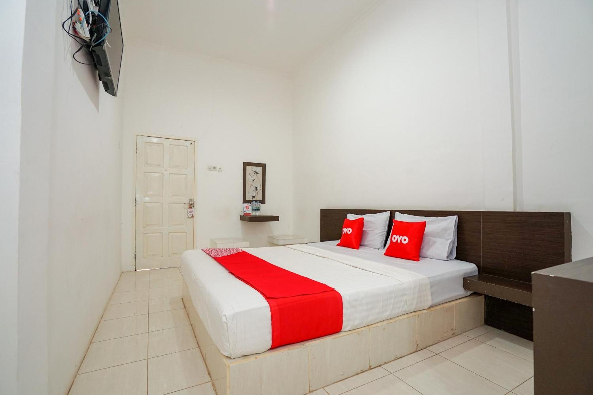 Super Oyo 1868 Penginapan Sekip Palembang Luaran gambar