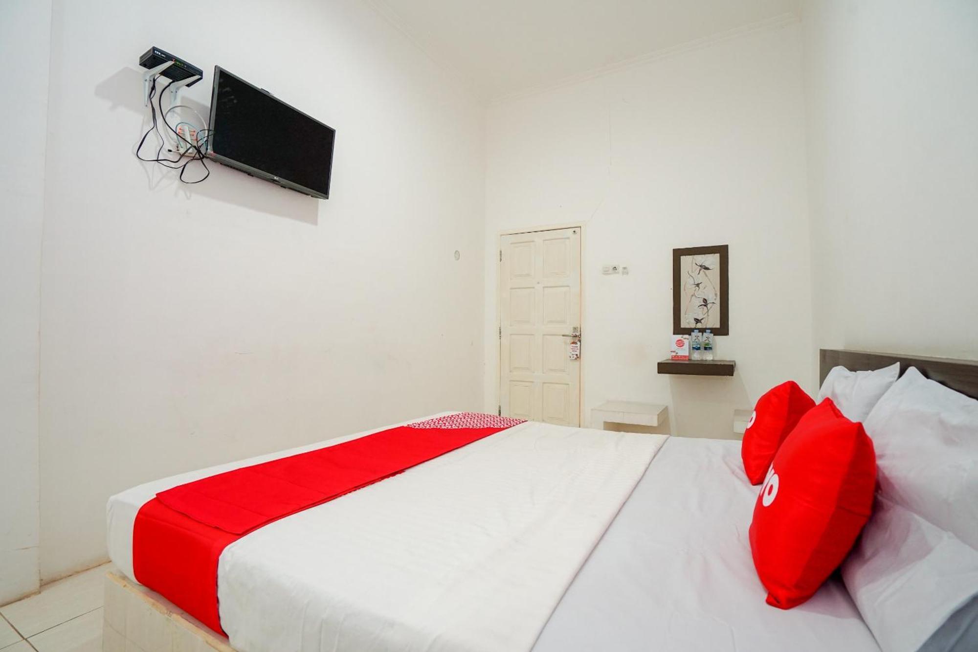 Super Oyo 1868 Penginapan Sekip Palembang Luaran gambar