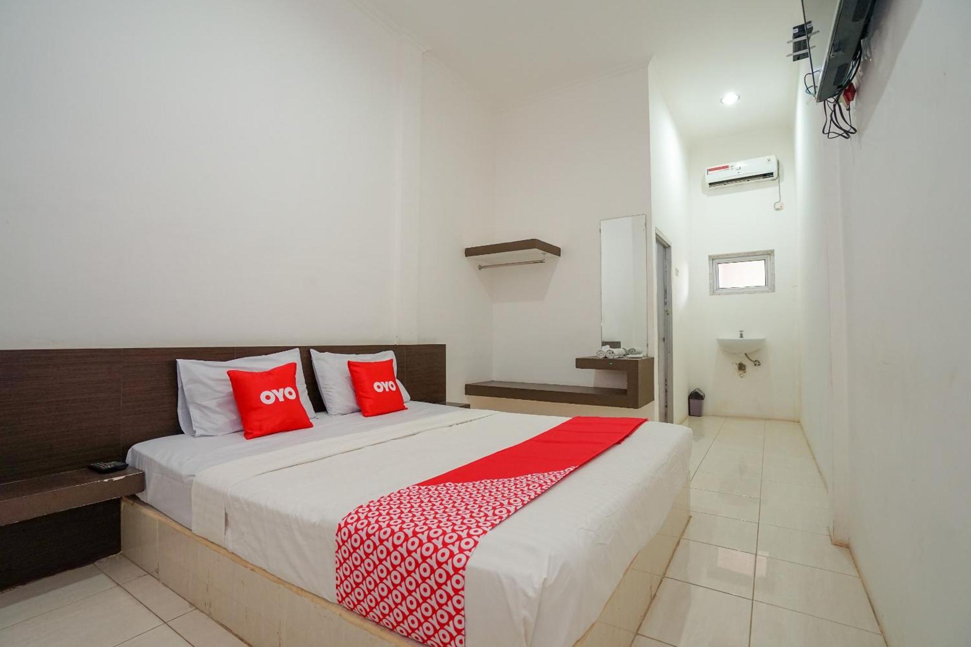 Super Oyo 1868 Penginapan Sekip Palembang Luaran gambar